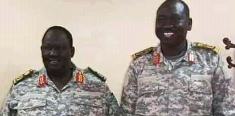 File photo: presidential adviser Tut Gatluak (L) and energy minister Dhieu Mathok (R) pose for a photo in Juba after their promotion on 23 January, 2020.