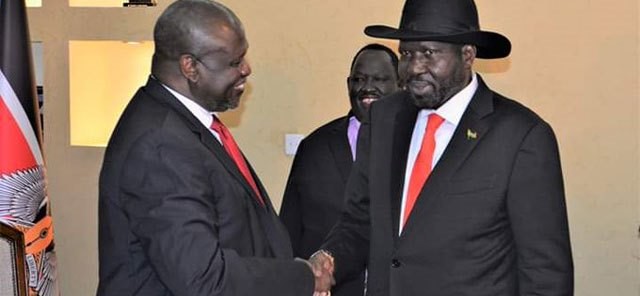 FILE PHOTO: Machar and Kiir in Juba
