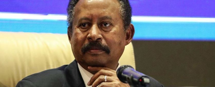 Prime minister of Sudan Abdalla Hamdok makes the announcement of the Transitional Government during a press conference in Khartoum, Sudan on 5 September 2019. [Mahmoud Hjaj - Anadolu Agency]