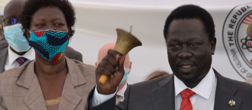 Vice President Hussein Abdelbagi, right, rings the bell in Juba to mark the beginning of the phased reopening of schools across South Sudan on October 5, 2020. (Radio Tamazuj photo)