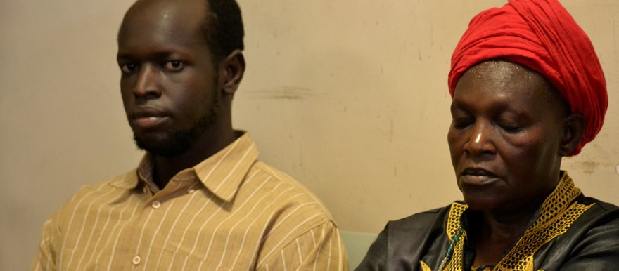 Babu Emmanuel Lokiri [Left] and his mother Alice Noel during their first appearance at the court in Juba on 10 October, 2020. (Radio Tamazuj photo)