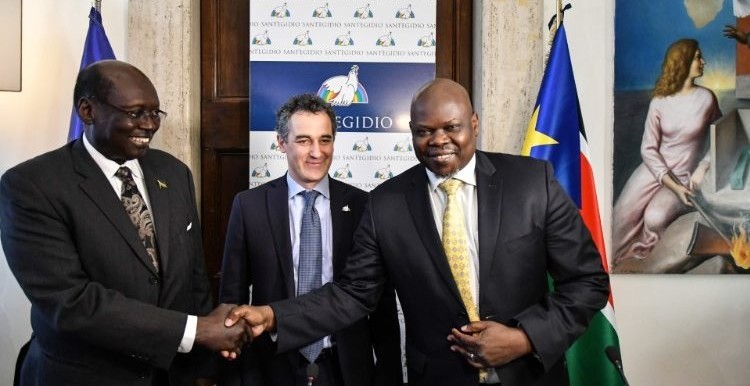 South Sudanese politicians shake hands at St- Egidio headquarters in Rome [Photo: AFP]