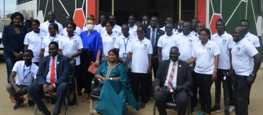 FIFA Secretary-General, Fatma Samba Diouf Samoura, SSFA President Augustino Maduot and other SSFA members outside their office in Juba.