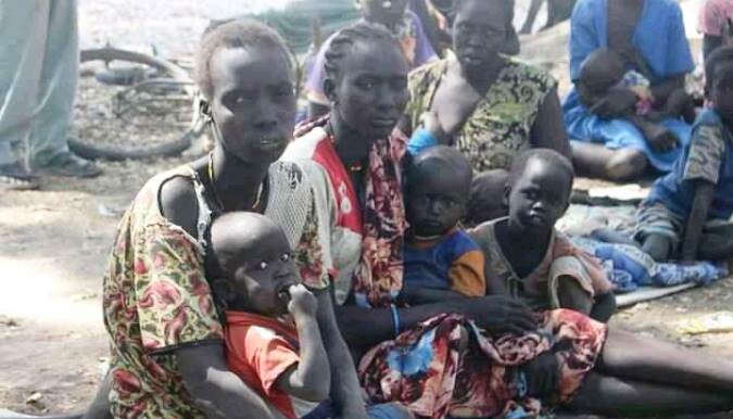 Women displaced from Aneet after intercommunal fighting in February. [File photo]