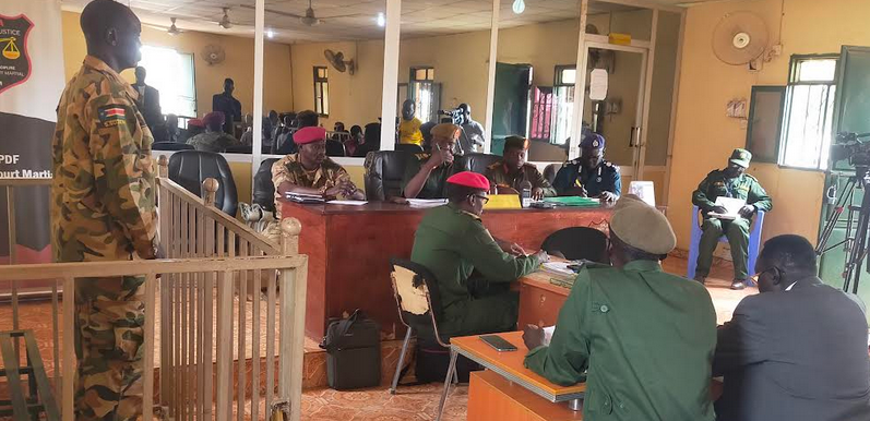 Private Garang (L) in the dock during General Court Martial proceedings in Juba on 28 February 2023. [Photo: Radio Tamazuj]