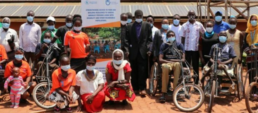 People living with disabilities pose for a picture at a past event organized by WFP and NGO Humanity & Inclusion in the town of Yambio. (WFP photo)