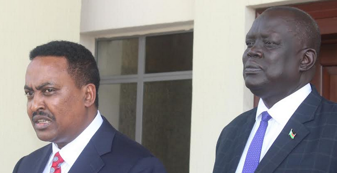IGAD’Executive SecretarY Dr. Workneh Gebeyehu (L) and South Sudanese Acting Foreign Minister Deng Dau (R) addressing the press in Juba. (Photo: Radio Tamazuj)