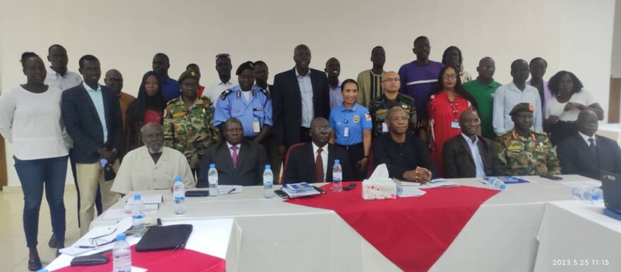 Security officials and journalists pose for a group photo after a workshop in Juba on Thursday on, May 25, 2023.