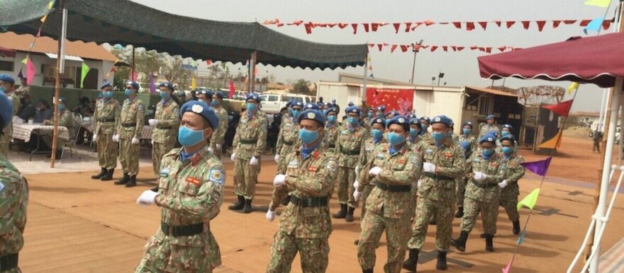 Vietnamese peacekeepers parading before receiving UN medals for their medical services in and around Bentiu in 2022. ( UNMISS photo)