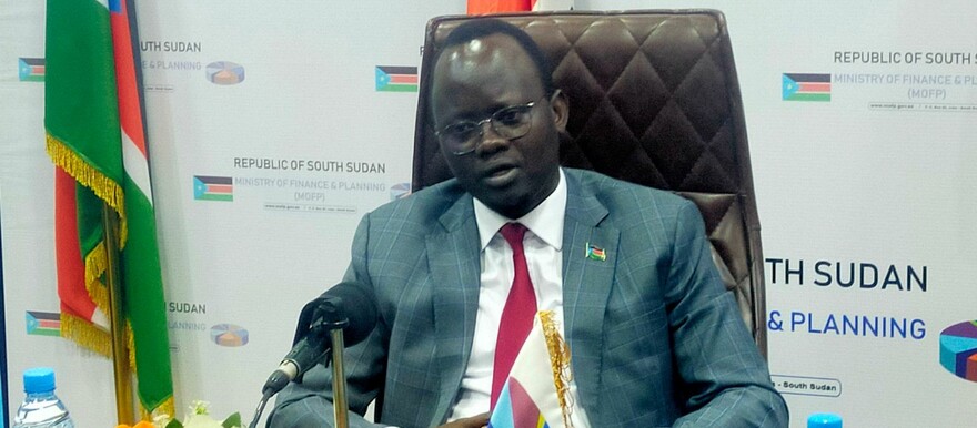 Finance Minister Bak Barnaba Chol addressing a press conference at his office on Monday evening. (Photo: Radio Tamazuj)