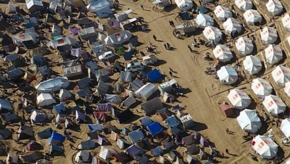 An aerial view of people displaced by the war in Sudan. (Credit: NRC)