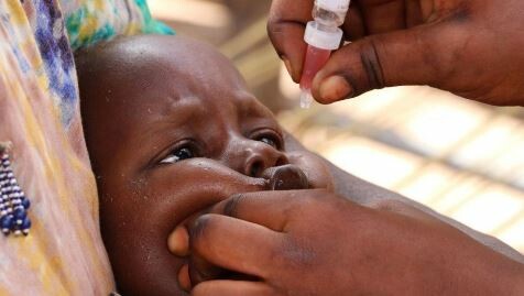 A child is given the polio vaccine. (File photo)