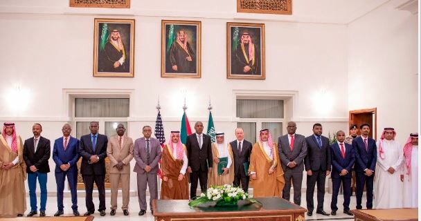 U.S. and Saudi officials pose for a photo with SAF and RSF representatives in Jeddah, Saudi Arabia, after inking a humanitarian ceasefire on 21 May 2023. (Courtesy photo)