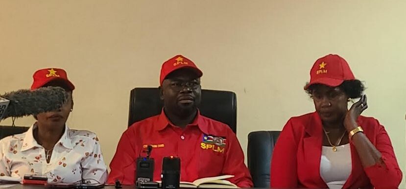 SPLM Party spokesperson Daniel Badagbu Rambasa (C) flanked by party officials at a press conference in Juba where he rubbished rumors about the postponement of the December elections. (Photo: Radio Tamazuj)