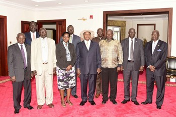 Photo: Representatives of the three SPLM factions that agreed to reunify the party and the Ugandan president