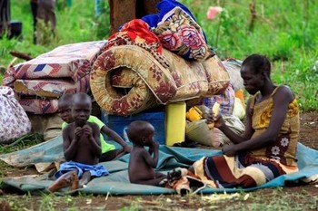 File photo: An elderly woman displaced by fighting in South Sudan rests by her belongings in Lamwo after fleeing fighting in Pajok town across the border in northern Uganda, April 5, 2017. (REUTERS/James Akena)