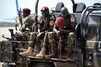 File photo: South Sudan soldiers sit on a truck at Juba airport in June 2014. (AFP)