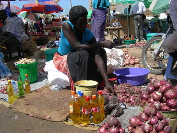 Photo: Woman selling commodities in Juba market (Nile merchant)