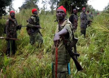 SPLA-IO (SPLA-In Opposition) rebels stand after an assault on government soldiers, outside the town of Kaya, August 26, 2017. REUTERS/Goran Tomasevic