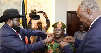 Photo: Gabiel Jok Riak being promoted by President Kiir before swearing in as new chief of general staff on May 4, 2018.