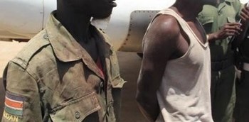 File photo: War prisoners captured in Wadakona arrive in Juba, 10 March 2015 (Radio Tamazuj)
