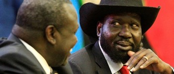 President Kiir (R) talks to opposition leader Riek Machar as they sign a ceasefire agreement in Khartoum, Sudan August 5, 2018. Image: REUTERS/Mohamed Nureldin Abdallah