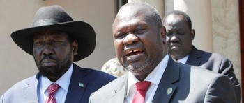 Opposition leader Riek Machar speaks during a news statement with President Salva Kiir (L) after a meeting in Juba, December 17, 2019. (REUTERS)