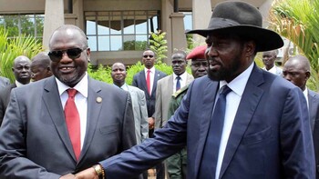 File photo: Kiir and Machar shake hands in July 2016.