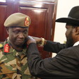 Photo: Gen. James Ajongo being promoted by President Kiir before swearing in as new chief of general staff on May 10, 2017. (Radio Tamazuj)