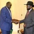 Photo: Yau Yau shakes hands with President Kiir (Radio Tamazuj)