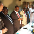 Photo: David Shearer (left) attends the signing of an agreement to cease hostilities between Jonglei and Boma regions. (UNMISS)