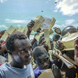 Photo: South Sudanese refugees demand to be registered at Imvepi reception centre in Arua district in Northern Uganda. (UNHCR/Jiro Ose)