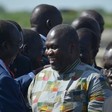 File photo: Riek Machar meets with his supporters after landing at Juba international airport on April 26, 2016 (AFP)