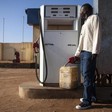 File photo: A man fills a jerry can with diesel at a fuel station in Juba. (REUTERS/Adriane Ohanesian)