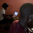 File photo: Two reporters at "The Citizen" newspaper work at their desks in Juba, South Sudan, 18 June 2012/REUTERS