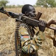 A South Sudan's army soldier holds his gun in Halop, Unity State on April 24, 2012. (Reuters)