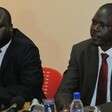 Photo: David Otim (R), principal representative for the SPLM/A in Opposition in Uganda, and Oyet Nathaniel Pierino, chairman for the rebel faction’s national committee for political mobilisation, speak at a press conference in the Ugandan capital, Kampala, on 22 September 2014 (ST)