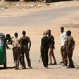Sudanese army soldiers man a checkpoint in Khartoum as violence between two rival Sudanese generals continues. AFP