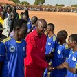 Warrap State Governor Kuol Muor Muor greeting some of the players before the start of the games. (Photo: Radio Tamazuj)